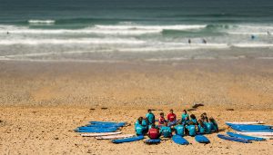Group surf lessons at fistral beach